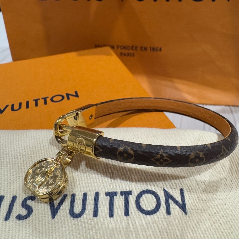 Louis Vuitton Monogram Key Holder with Gold Accents